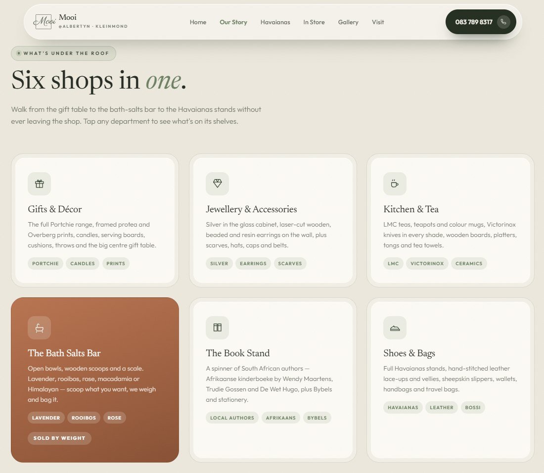Mooi gift shop website — a six-card department grid over a soft cream background, with one card in terracotta highlighting the bath salts bar